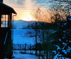 SUNSET IN THE MOUNTAINS