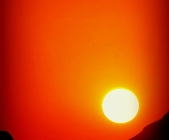 The splendid silent sun at the sunset sky directly from my window