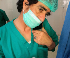 Anaesthtist with keen eye to patient.....