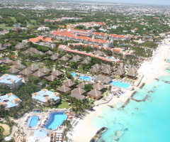 Para Sailing Over The Sandos Playacar Resort In The Yucatan Peninsula Of Mexico And Over The Caribbean