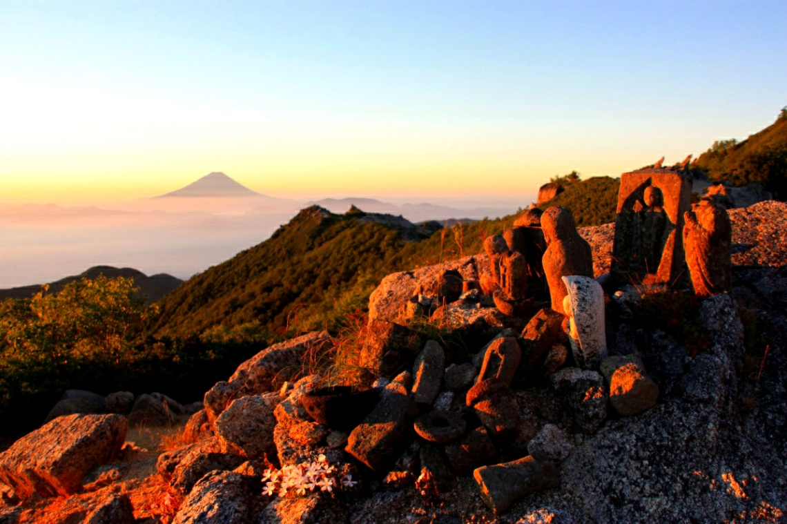 Dawn at mountain above the cloud