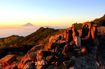 Dawn at mountain above the cloud