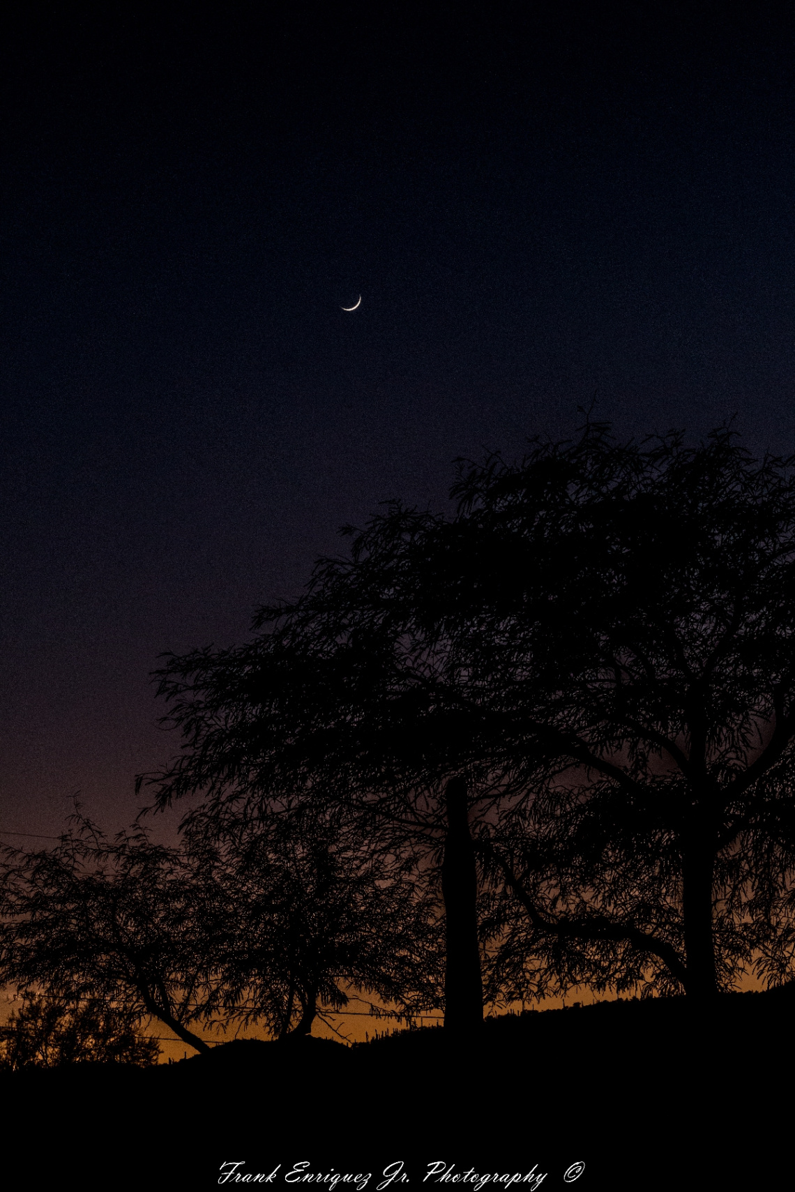The Moon Chasing The Sun Over Tucson Arizona