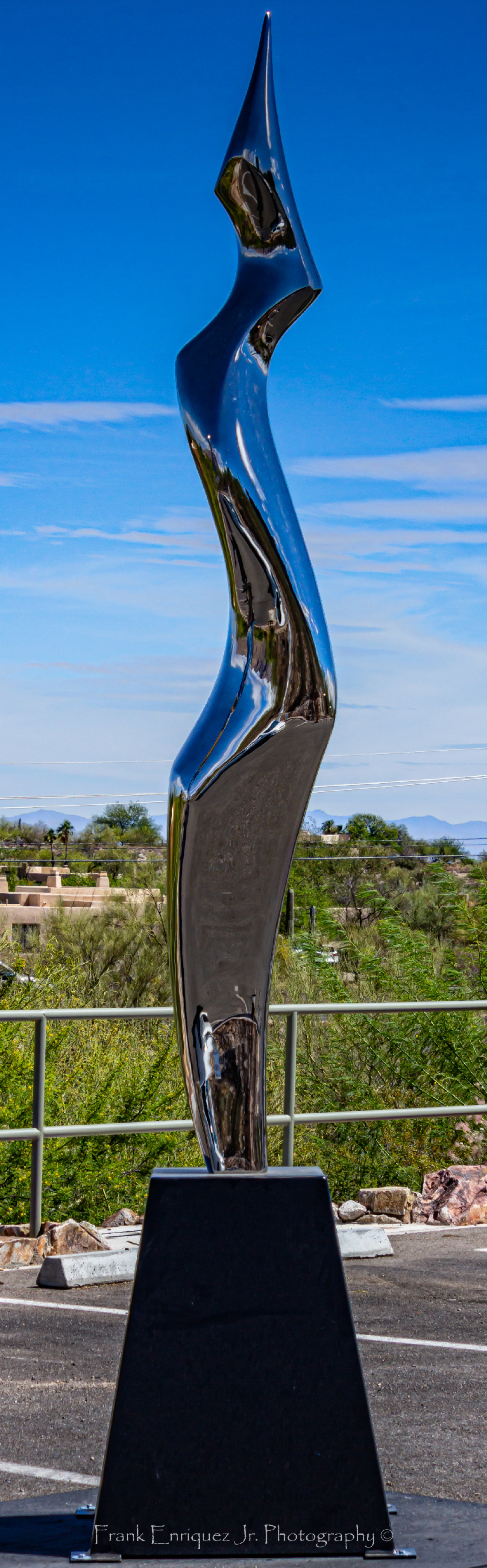 Chrome Sculpture In A Hot Desert