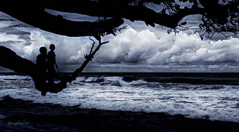 silhouette of two brothers
