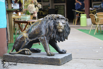 Bronze lion on a terrace of Santillana d