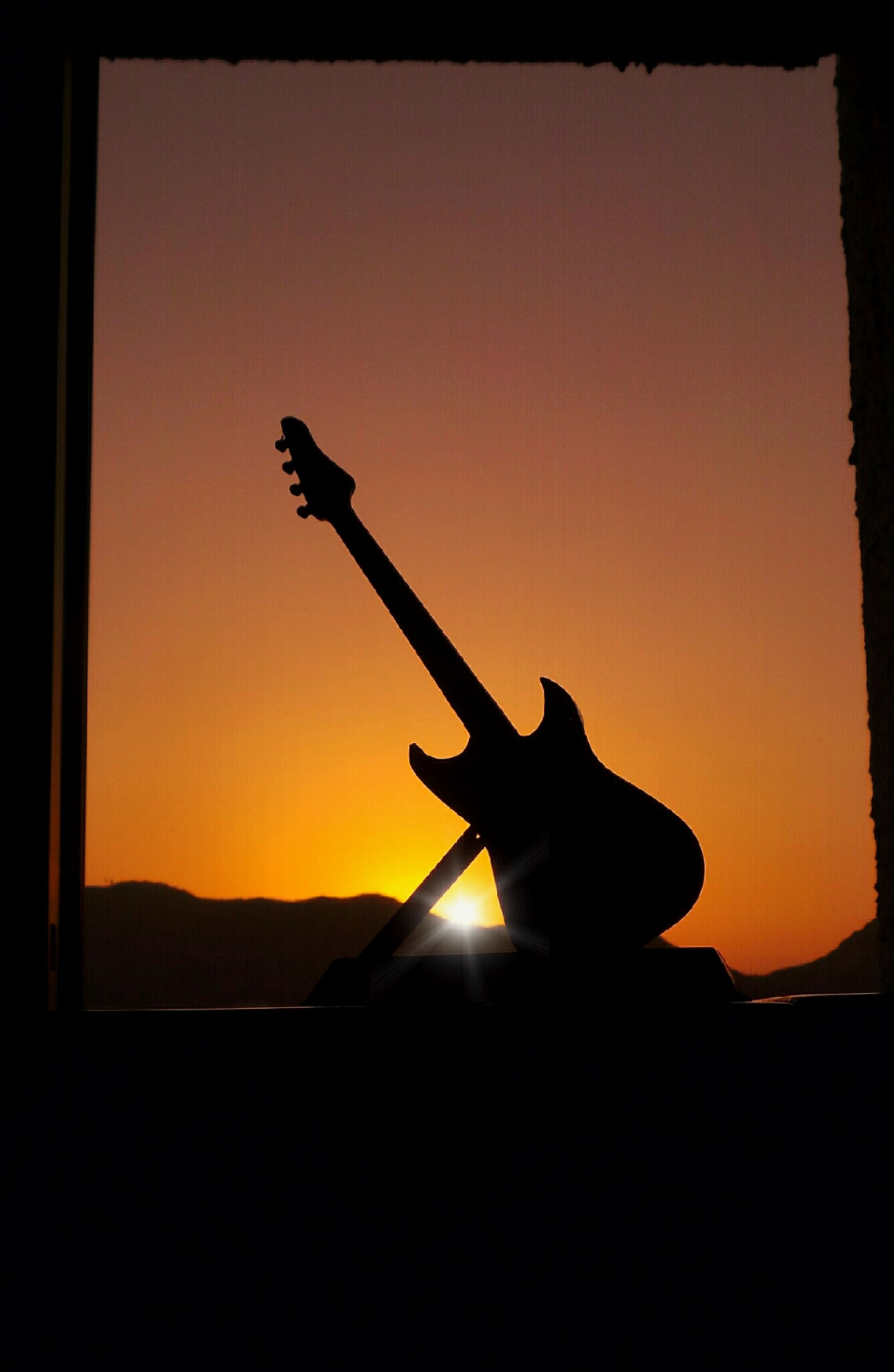 Window, Guitar and Sunlit 