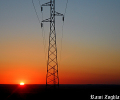Sunrise and electric pole